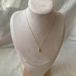 Tiny gold ghost necklace